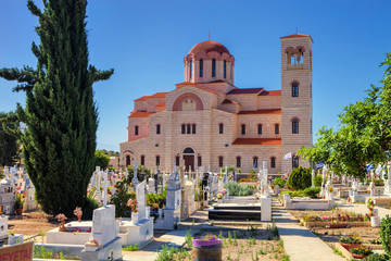 Fototapeta na wymiar Orthodox church at the cemetery