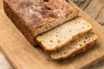 Fototapeta na wymiar Sliced loaf of homemade unleavened wheat bread