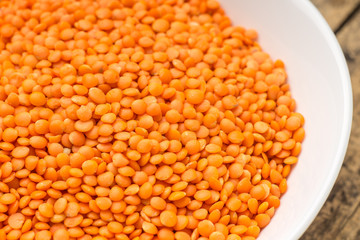 Raw lentil in bowl