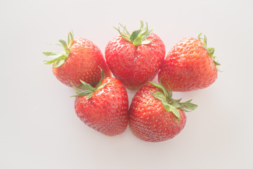 Fresh ripe strawberries on white background
