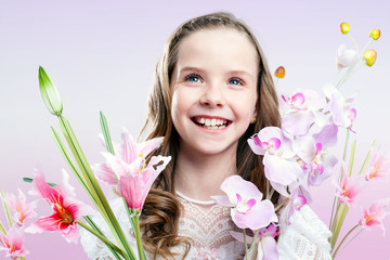 Obraz na płótnie Canvas Fun portrait of girl with flowers.