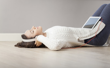 Young woman listening music