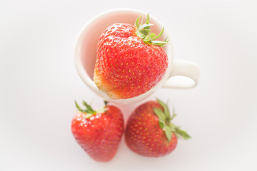 Fresh ripe strawberries on white background