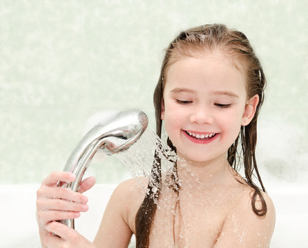 Happy Little Girl Closeup Taking Shower