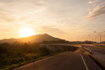 Road and bridge during sunset