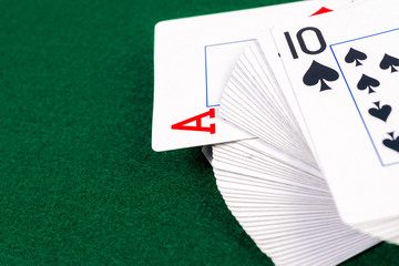 Deck of card with ace peeking out