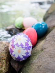 easter eggs on water fall