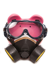 piggy bank wearing industrial gas mask