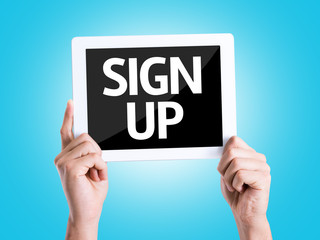 Tablet pc with text Sign Up with blue background