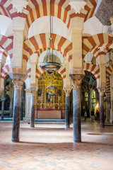 Fototapeta na wymiar CORDOBA, SPAIN September 5, 2014: .arches and columns of red and