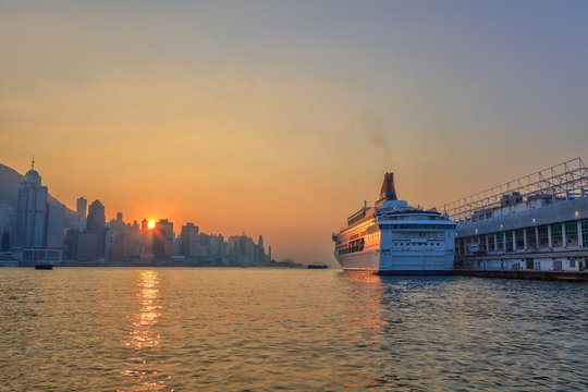 sunset at Hong Kong city skyline and view of Victoria Bay