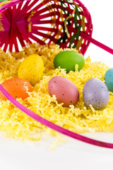 colored Easter eggs in a basket