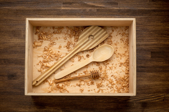 Set of kitchen utensils in wooden box background