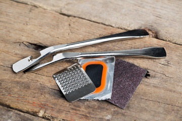 Bicycle repair kit  on wooden table
