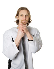 Hockey player leaning on stick