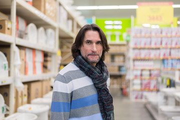 Portrait of  middle-aged man in a store building materials