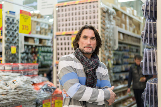 Portrait of  middle-aged man in a store building materials