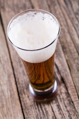 Beer bottle with a glass and spica