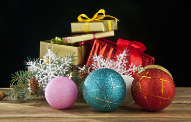 branch of fir-tree, snowflakes and new-year decorations
