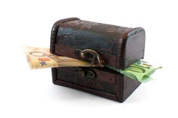 Chest with euro bills falling out