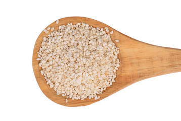 sesame seeds with wooden spoon on a white background