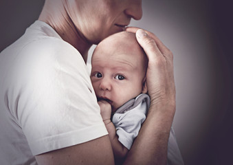 father holding baby 02