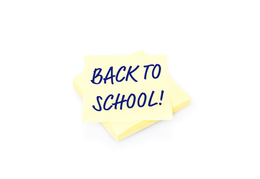 Yellow sticky note on block with text Back To School