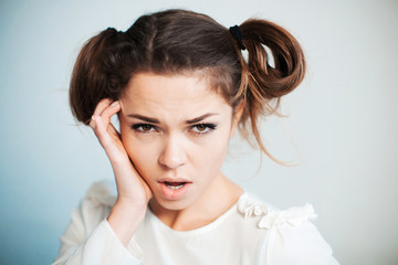 The sad woman with a headache