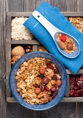 granola, oatmeal, berries and nuts. top view