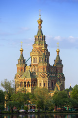 Fototapeta na wymiar Russia, Peterhof and the Church of St. Peter and Paul