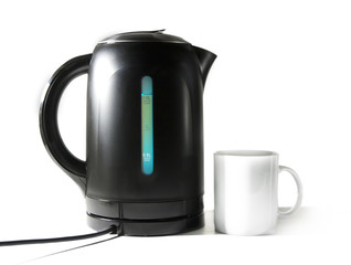 electric tea kettle and a mug