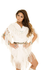 Native American woman in white hands on hips