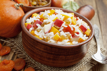 Sweet pilaf with pumpkin, apples and dried fruit