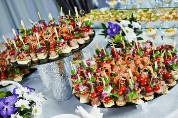 catering service table with food set