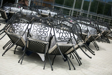 Tables and chairs in restaurant
