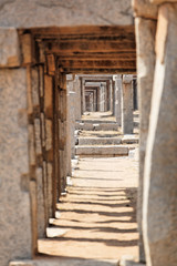 Fototapeta na wymiar Stone walkway at the temple in Hampi, Karnataka, India