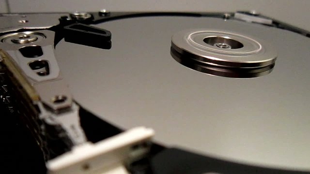 HDD - Hard Disk Drive is open, broken and spin out