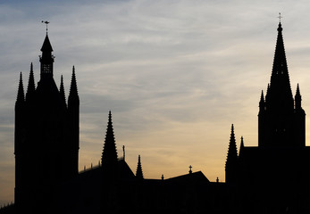 Ypres, Belgium, towers on market place at dusk