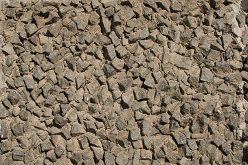 Wall made of gravel. Stone