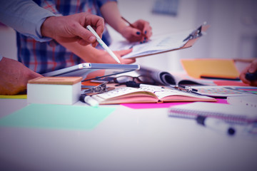 Young business people working at office on new project