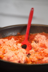 cooking bolognese sauce
