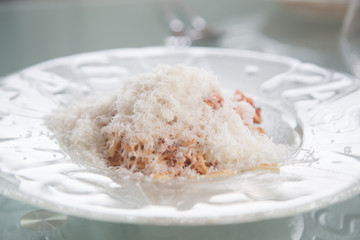 pasta bolognese on transparent plate