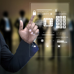 Businessman pressing virtual buttons