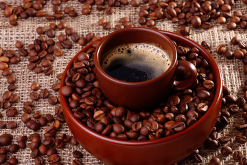 Coffee beans in a cup