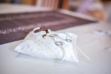 Fototapeta na wymiar Wedding rings set on a table
