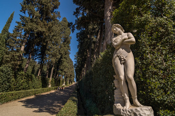 Fototapeta na wymiar Sculpture of a naked woman in the Cypress Alley, Florence