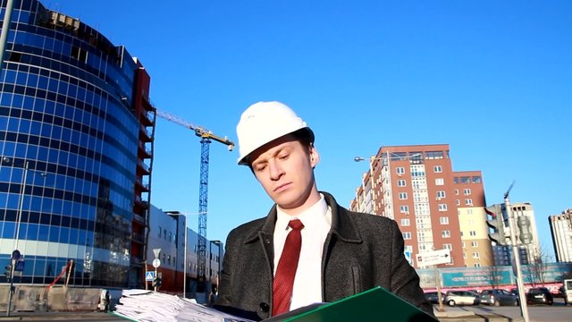 young architect at a construction site