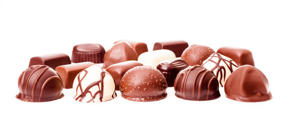 Chocolate truffles on white background