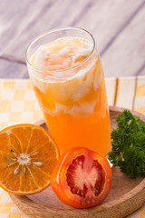 Coconut, orange, and tomato smoothies