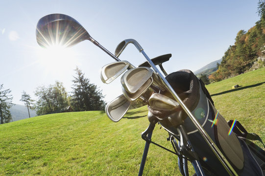 Italy, Kastelruth, Golf clubs in golf bag on golf course